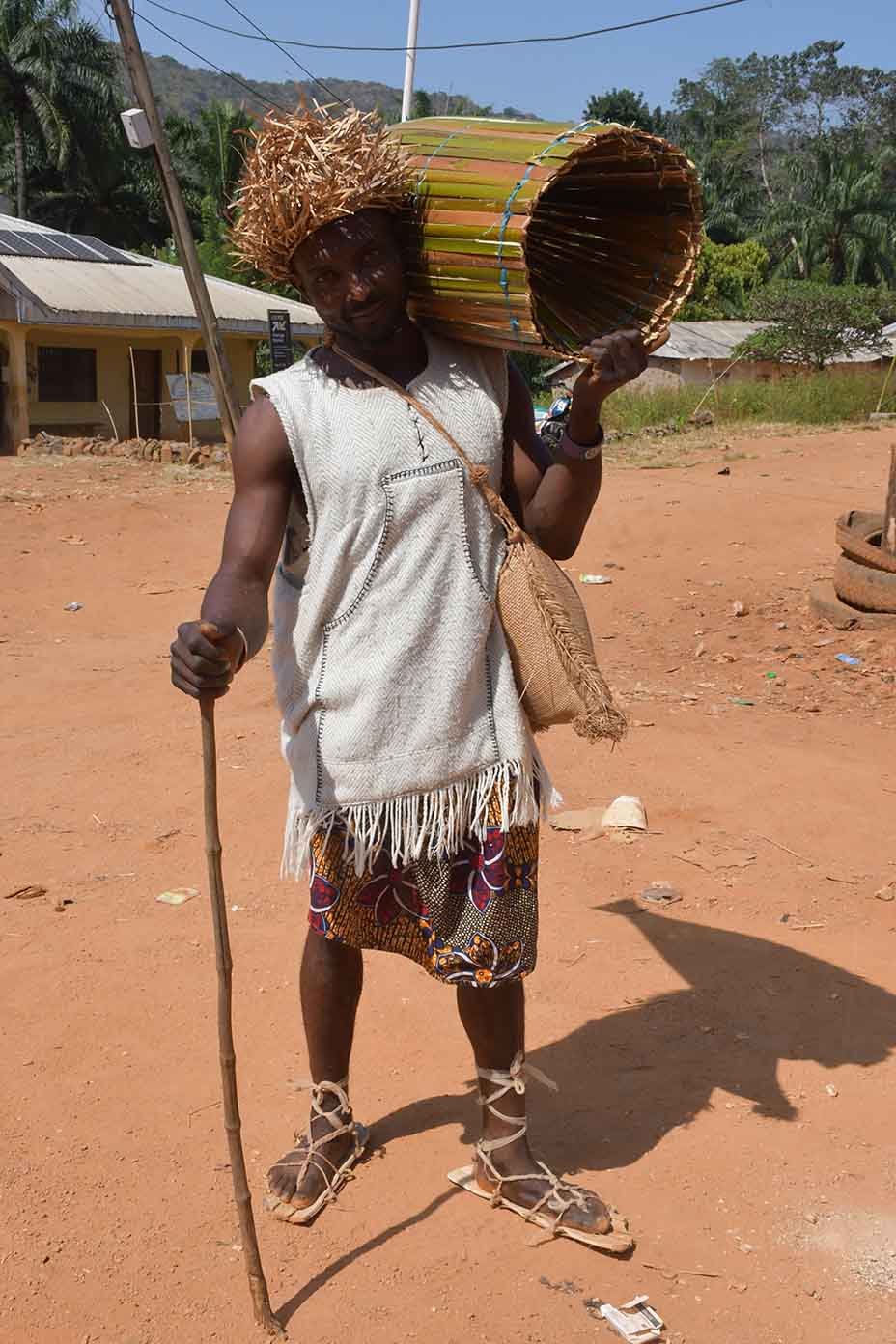 Tukubum Man Carrying a big woven basket